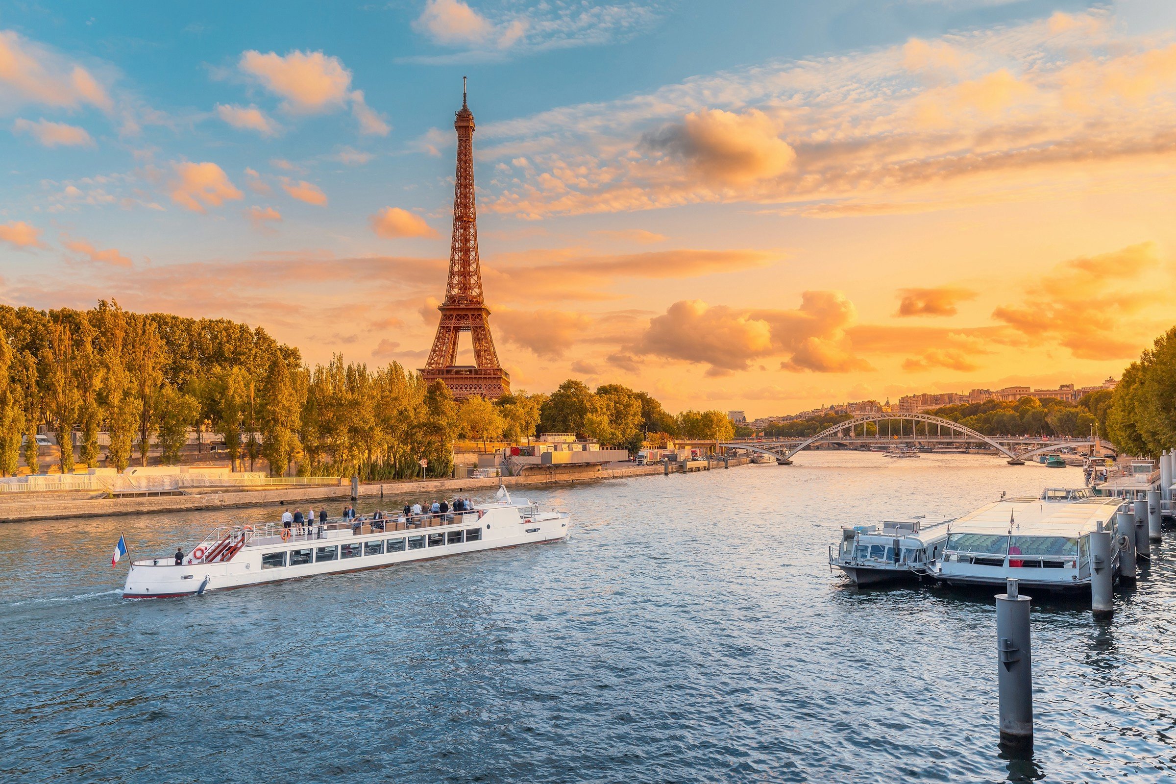 Views of the Seine River and Eiffel Tower at sunset